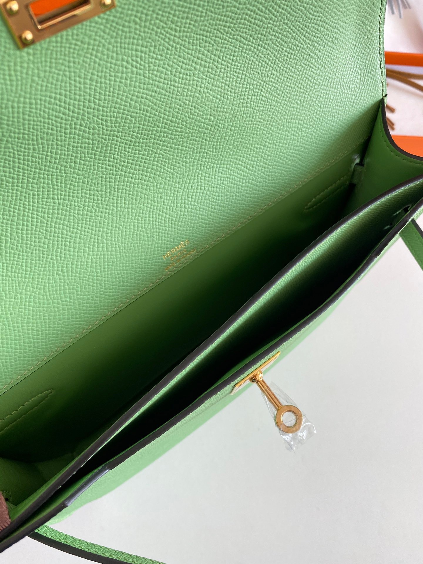 H**mes kelly depeches 25 pouch in vert criquet epsom calfskin