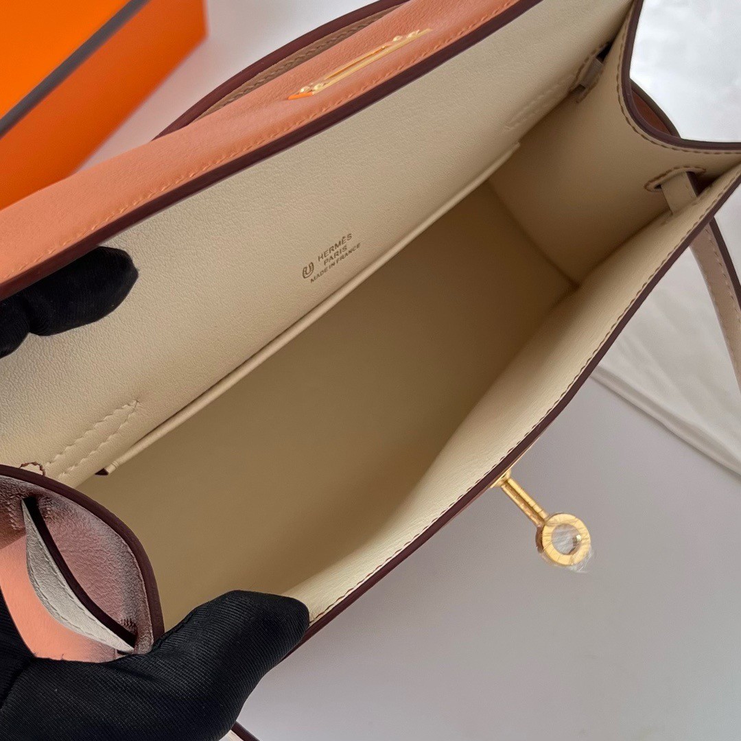 H**mes hss kelly pochette bicolor bag in gold and craie swift calfskin