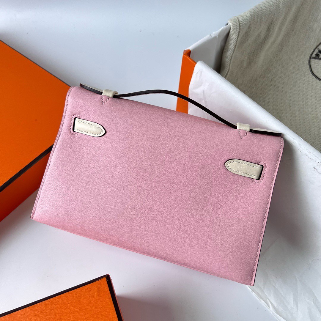 H**mes hss kelly pochette bicolor bag in pink and craie swift calfskin