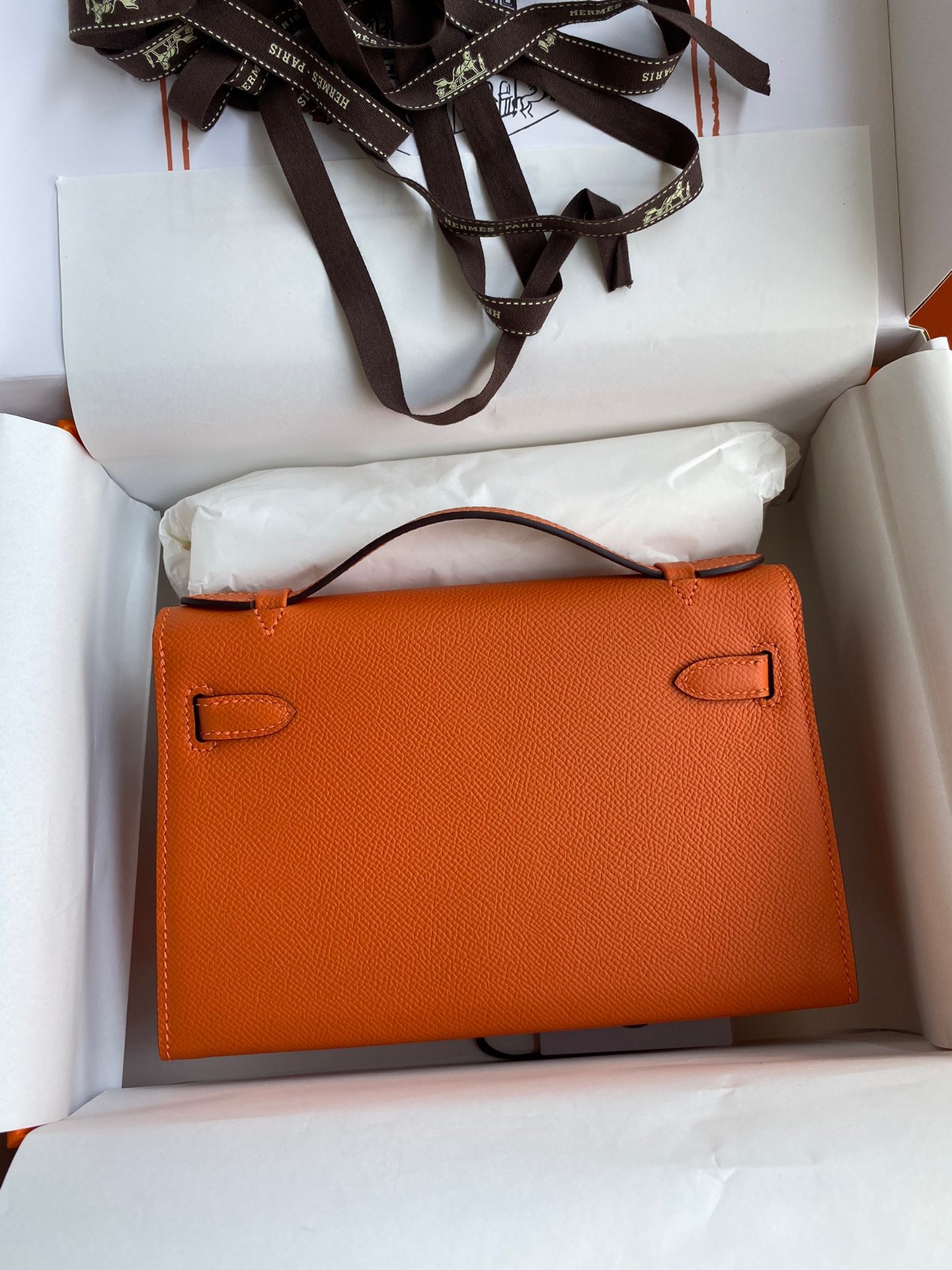 H**mes kelly pochette handmade bag in orange epsom calfskin