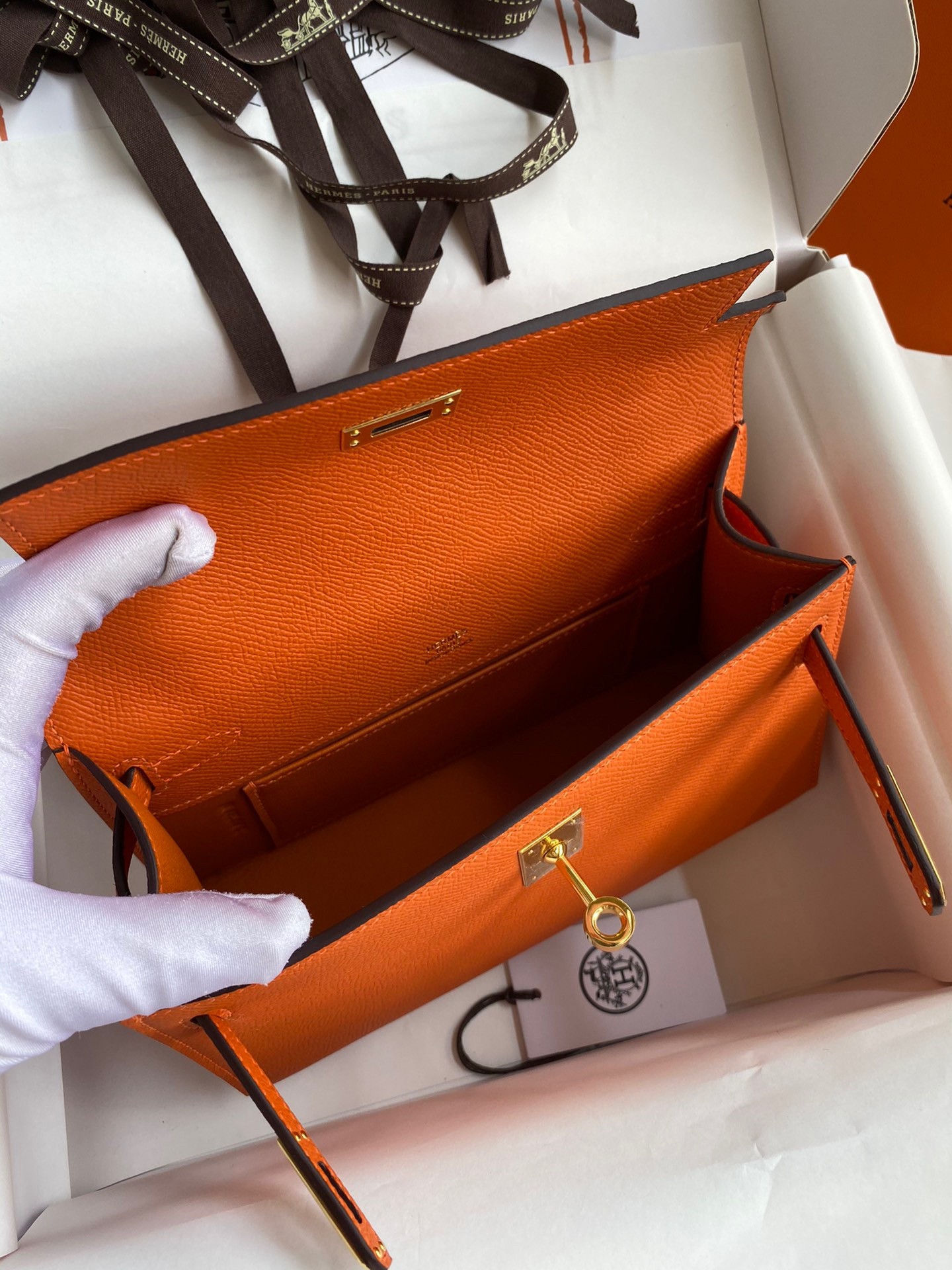 H**mes kelly pochette handmade bag in orange epsom calfskin