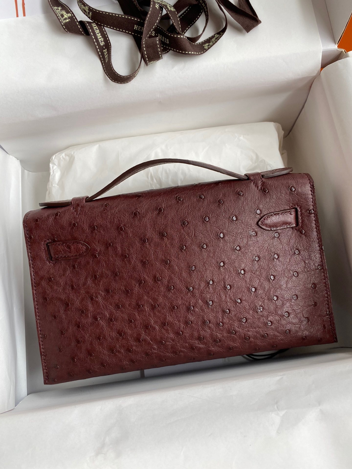 H**mes kelly pochette handmade bag in bordeaux ostrich leather