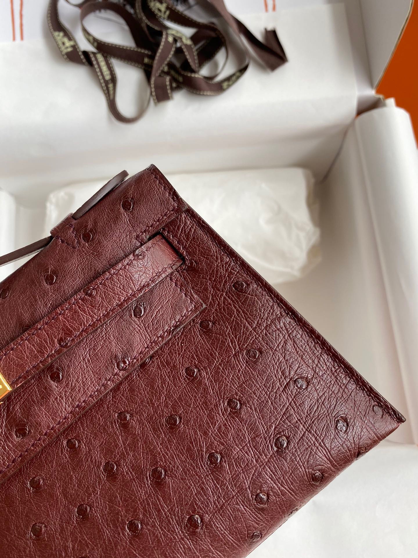 H**mes kelly pochette handmade bag in bordeaux ostrich leather