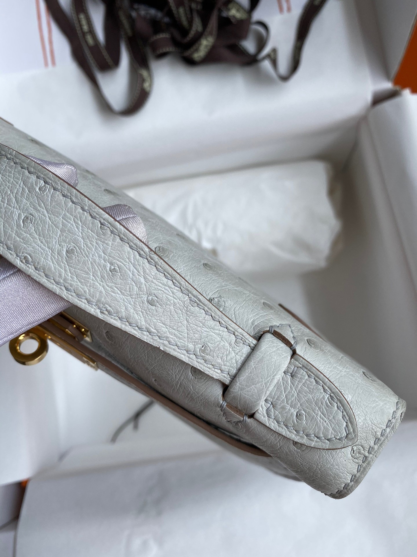 H**mes kelly pochette handmade bag in pearl grey ostrich leather