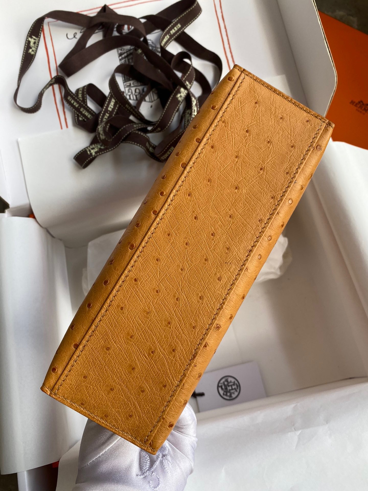 H**mes kelly pochette handmade bag in sesame ostrich leather