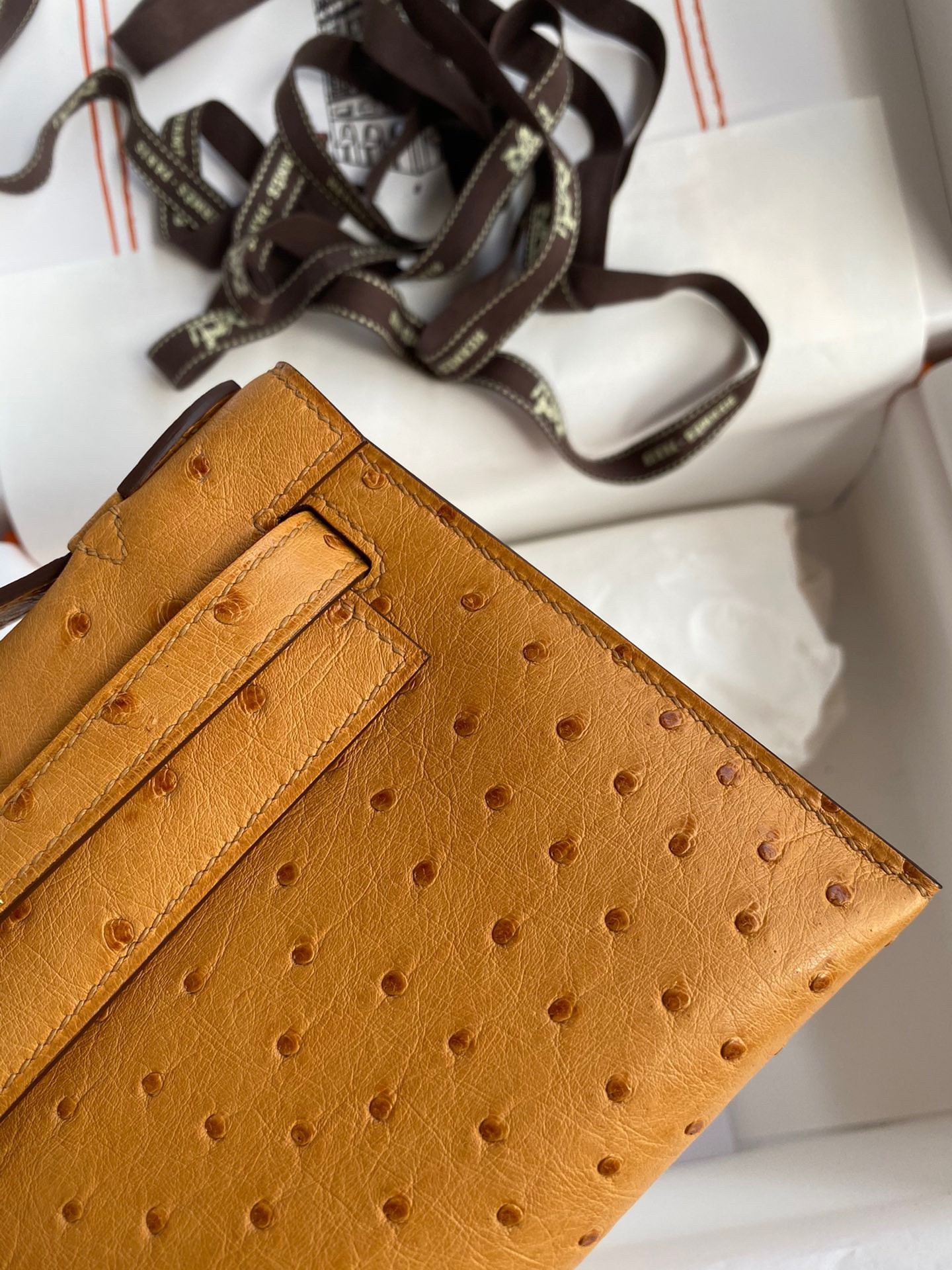 H**mes kelly pochette handmade bag in sesame ostrich leather