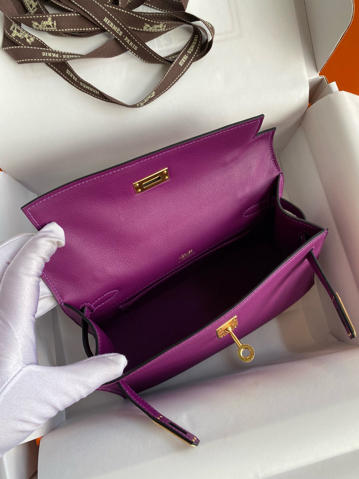 H**mes kelly pochette handmade bag in anemone swift calfskin