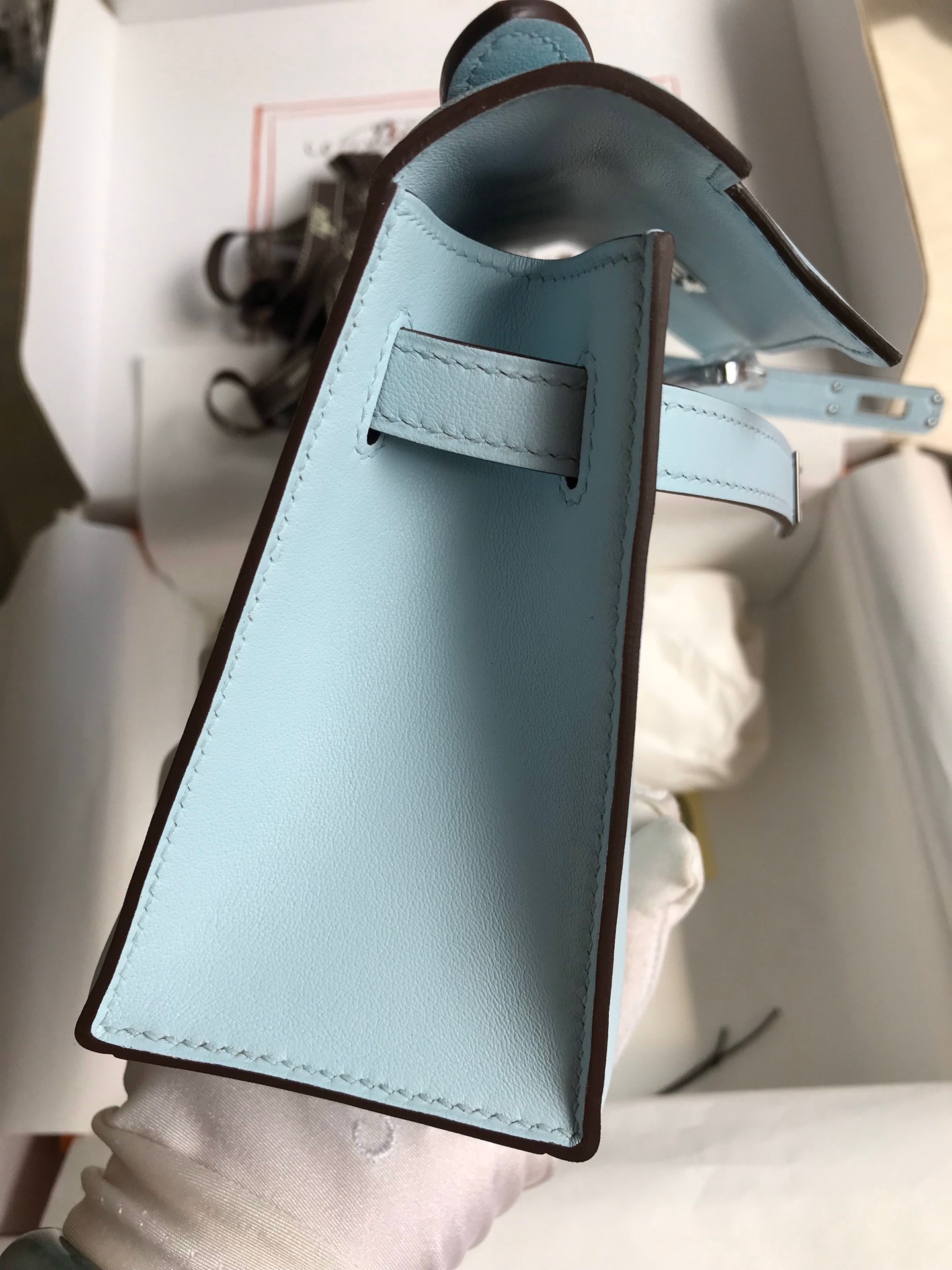 H**mes kelly pochette handmade bag in blue brume swift calfskin