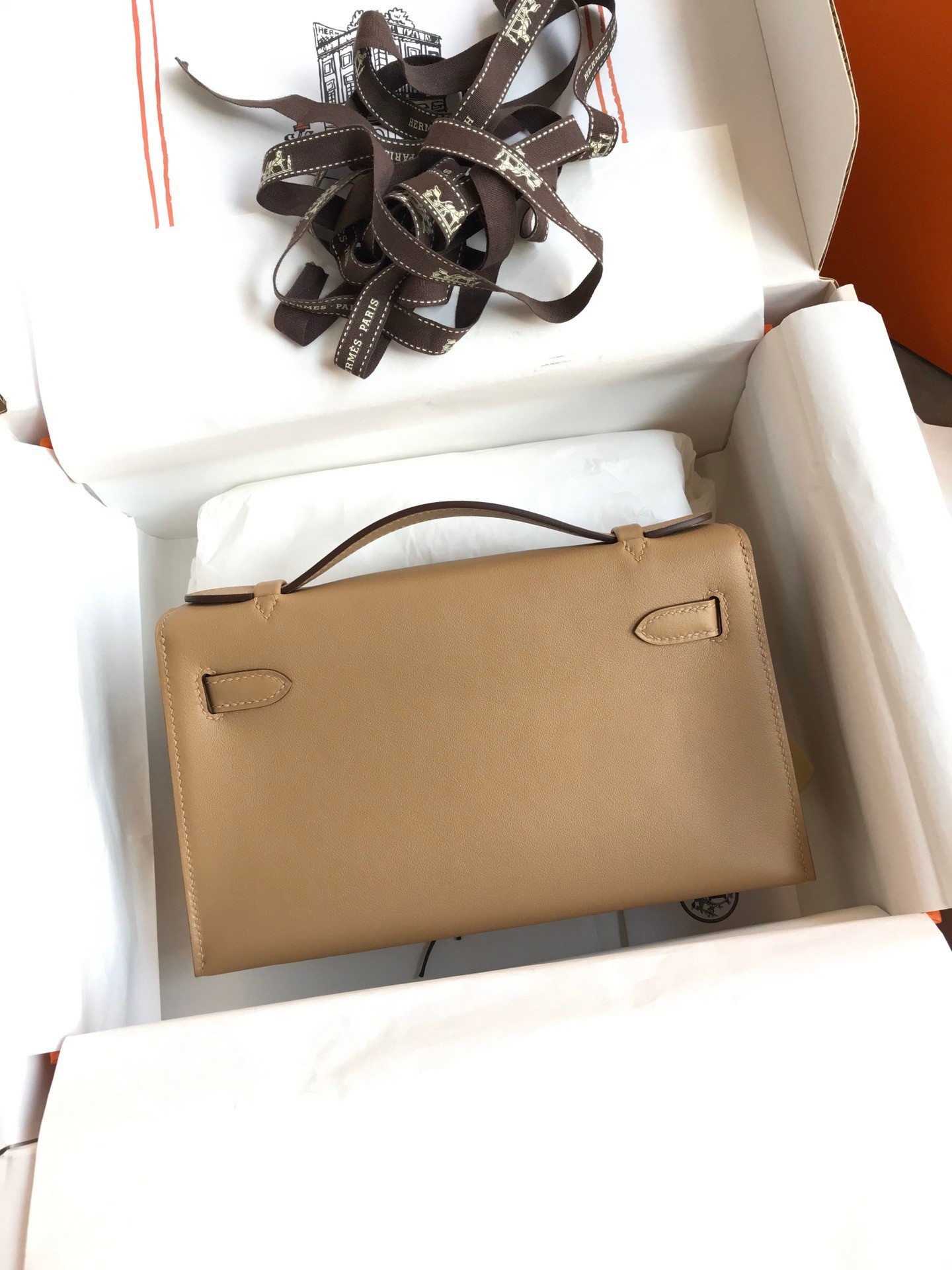 H**mes kelly pochette handmade bag in biscuit swift calfskin