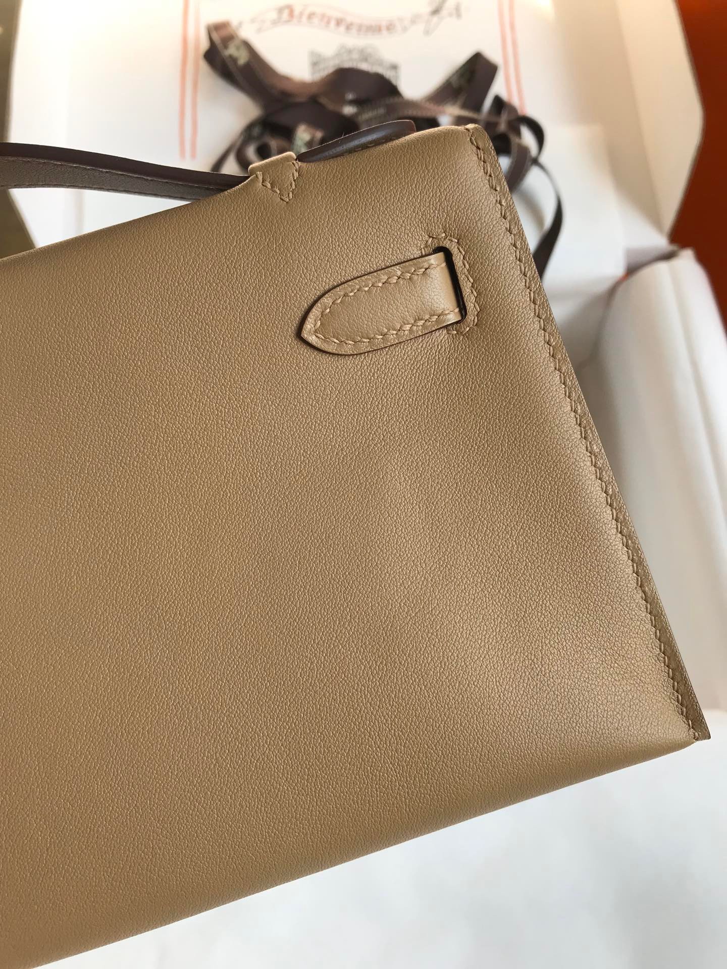 H**mes kelly pochette handmade bag in biscuit swift calfskin