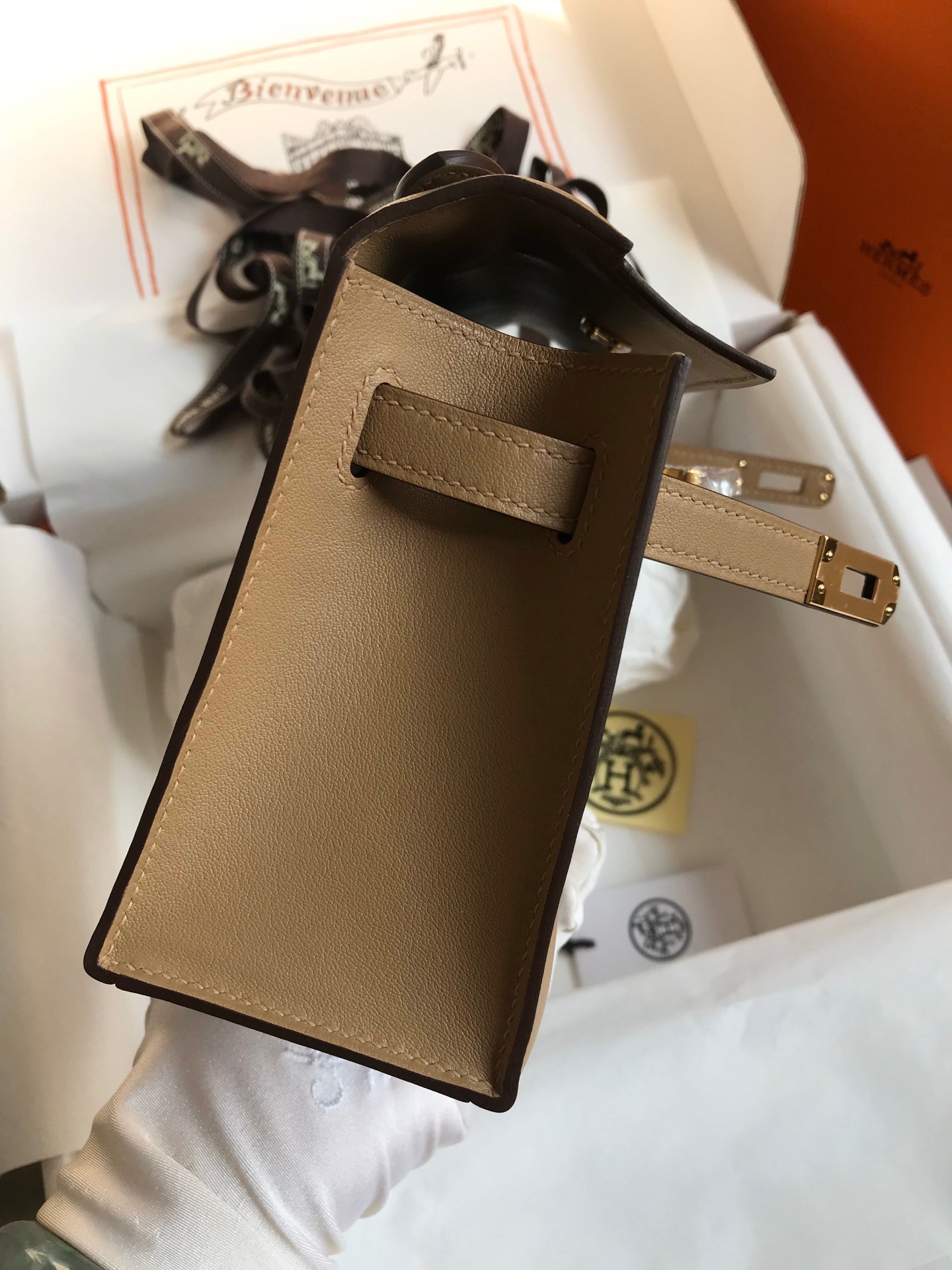 H**mes kelly pochette handmade bag in biscuit swift calfskin