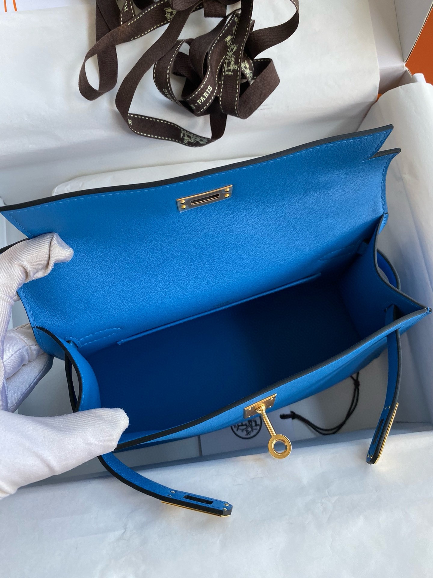 H**mes kelly pochette handmade bag in blue zanzibar swift calfskin