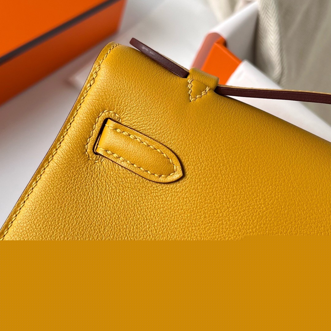 H**mes kelly pochette handmade bag in jaune ambre swift calfskin