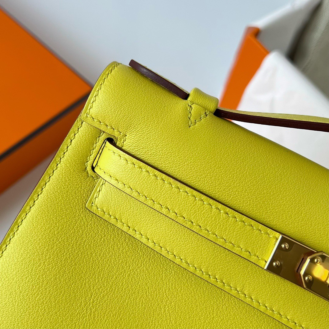 H**mes kelly pochette handmade bag in lime swift calfskin