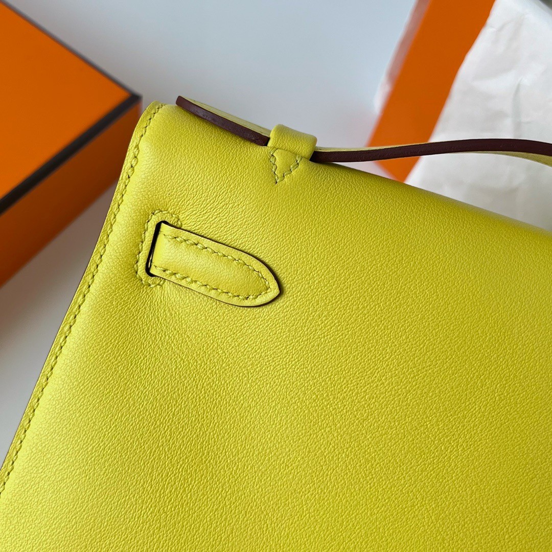H**mes kelly pochette handmade bag in lime swift calfskin