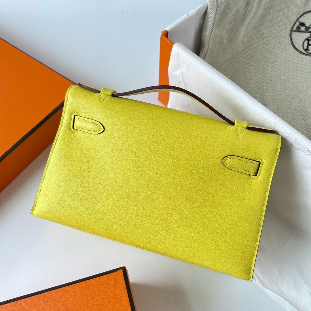 H**mes kelly pochette handmade bag in lime swift calfskin