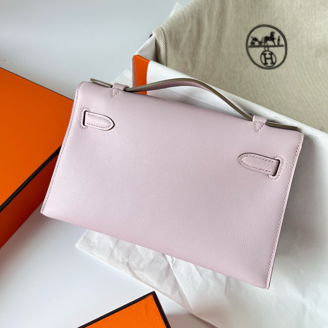 H**mes kelly pochette handmade bag in mauve pale swift calfskin