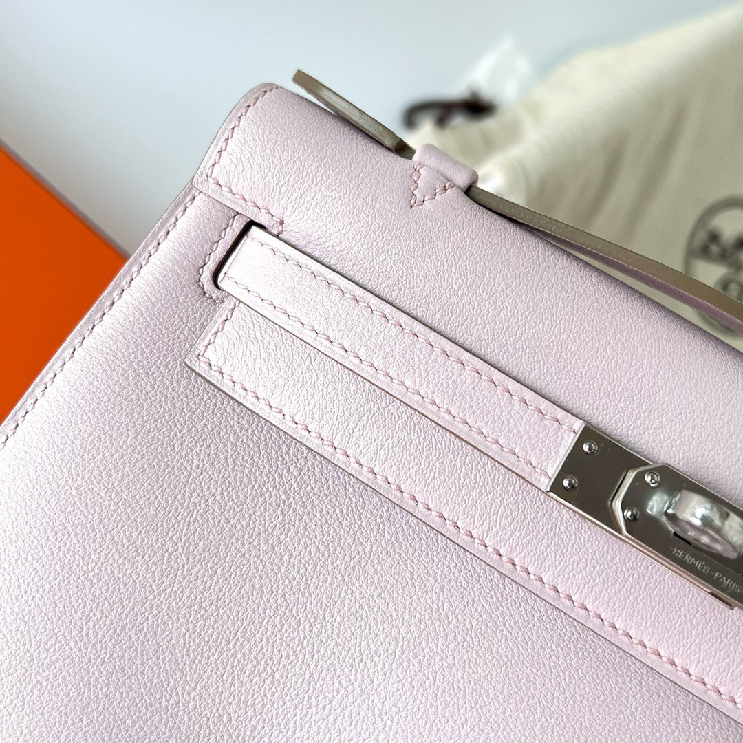 H**mes kelly pochette handmade bag in mauve pale swift calfskin