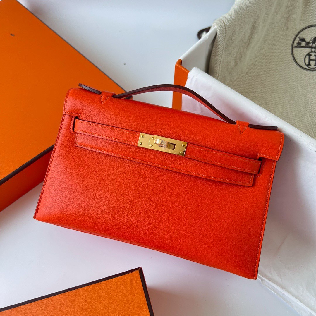 H**mes kelly pochette handmade bag in rouge piment swift calfskin