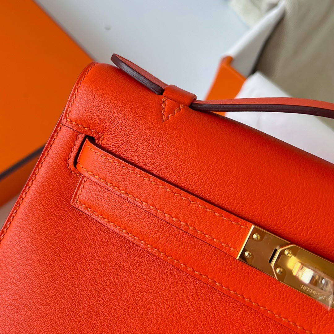 H**mes kelly pochette handmade bag in rouge piment swift calfskin