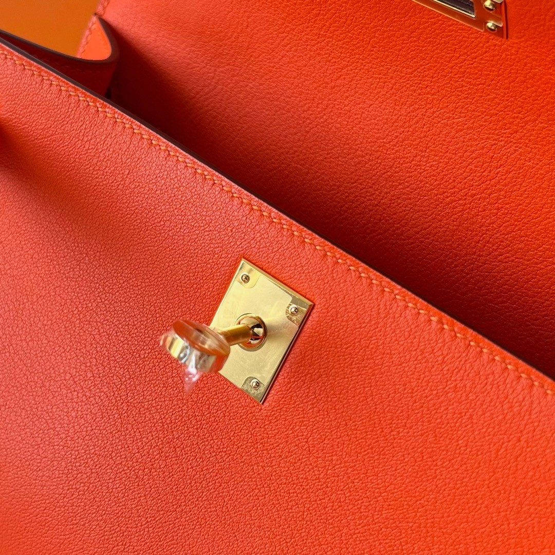 H**mes kelly pochette handmade bag in rouge piment swift calfskin