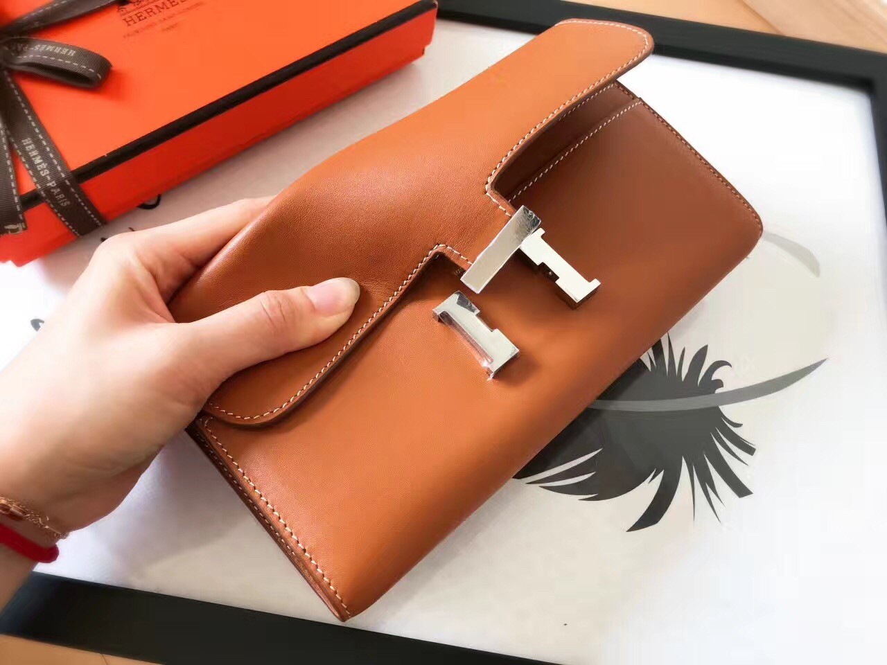 H**mes gold swift constance long wallet