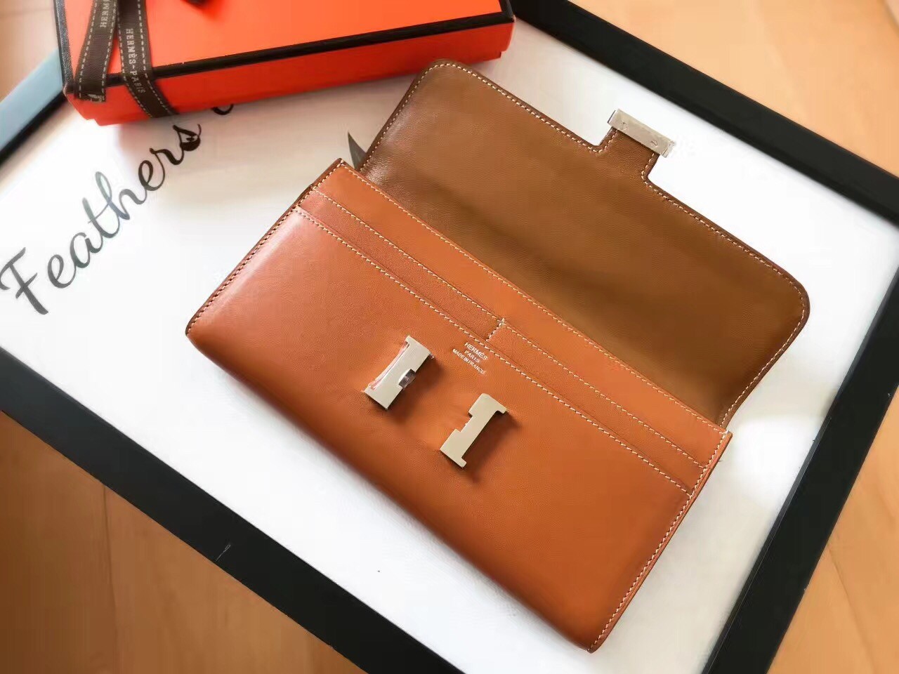 H**mes gold swift constance long wallet