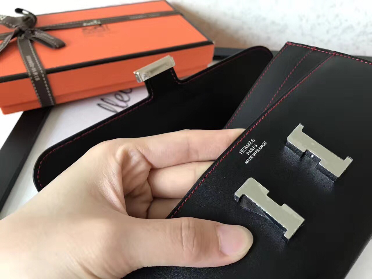 H**mes black swift constance long wallet