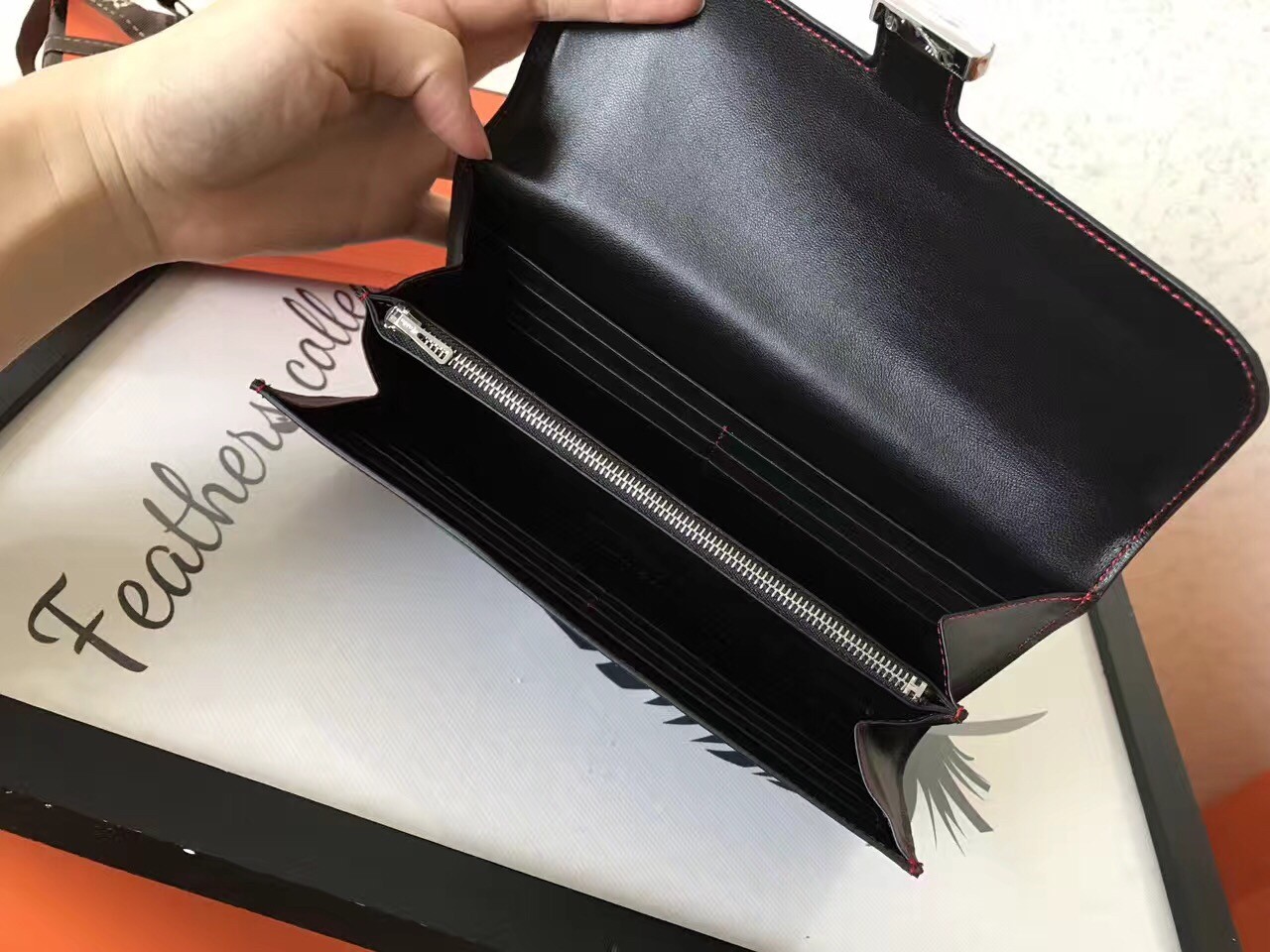 H**mes black swift constance long wallet