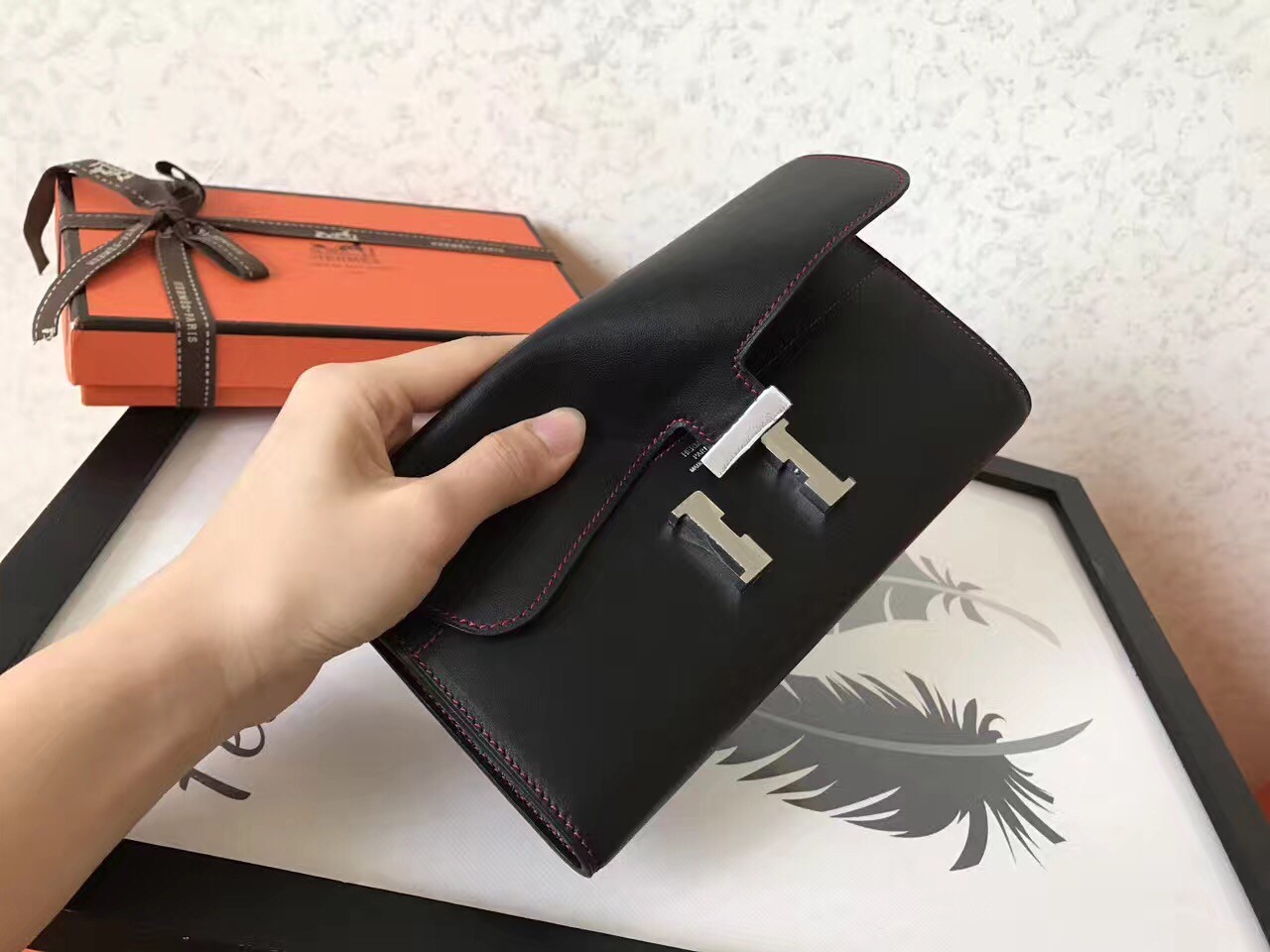 H**mes black swift constance long wallet
