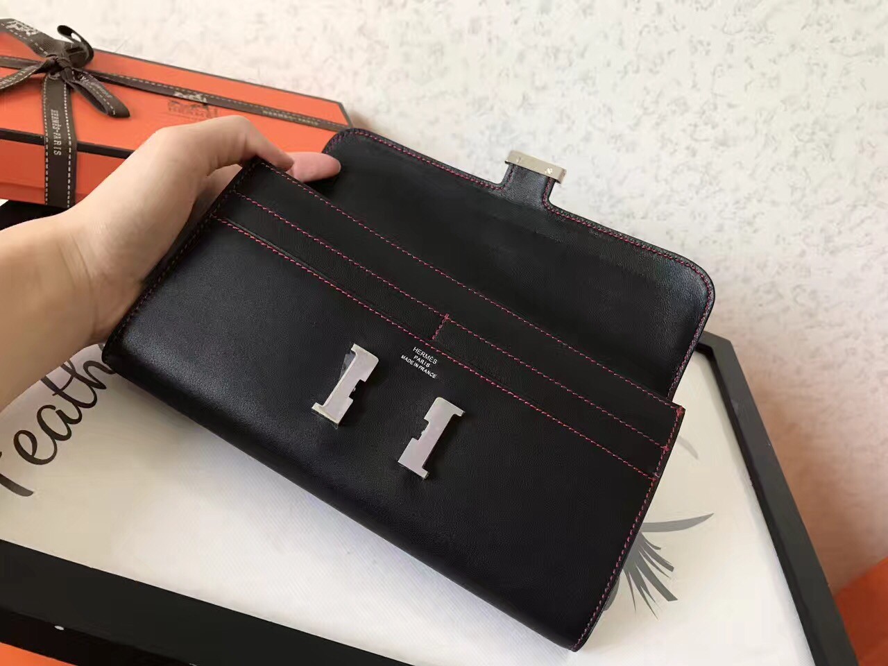 H**mes black swift constance long wallet