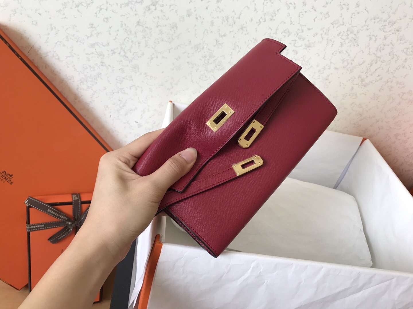 H**mes kelly classic long wallet in ruby epsom leather