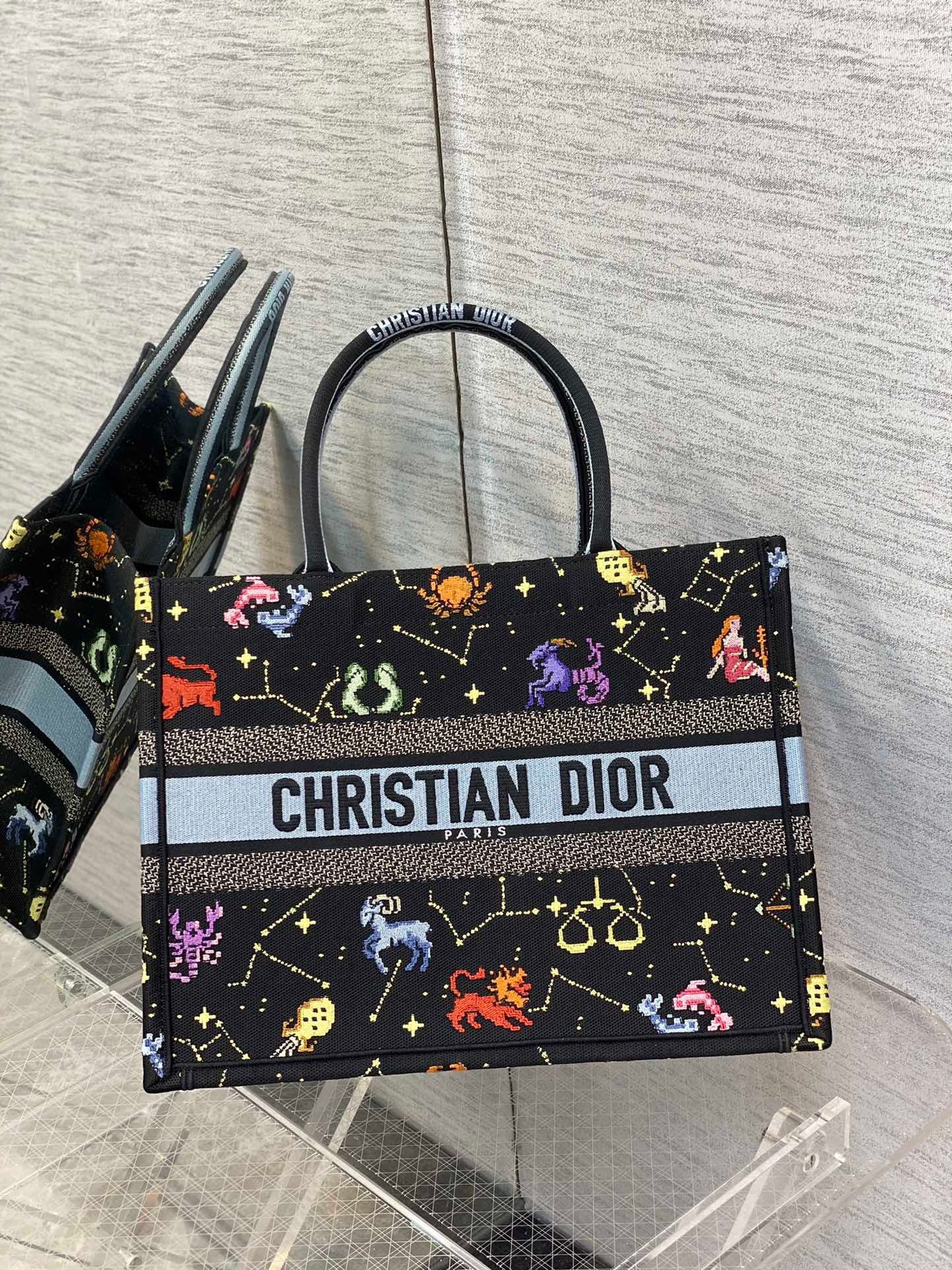 D*or medium book tote bag in black pixel zodiac embroidery