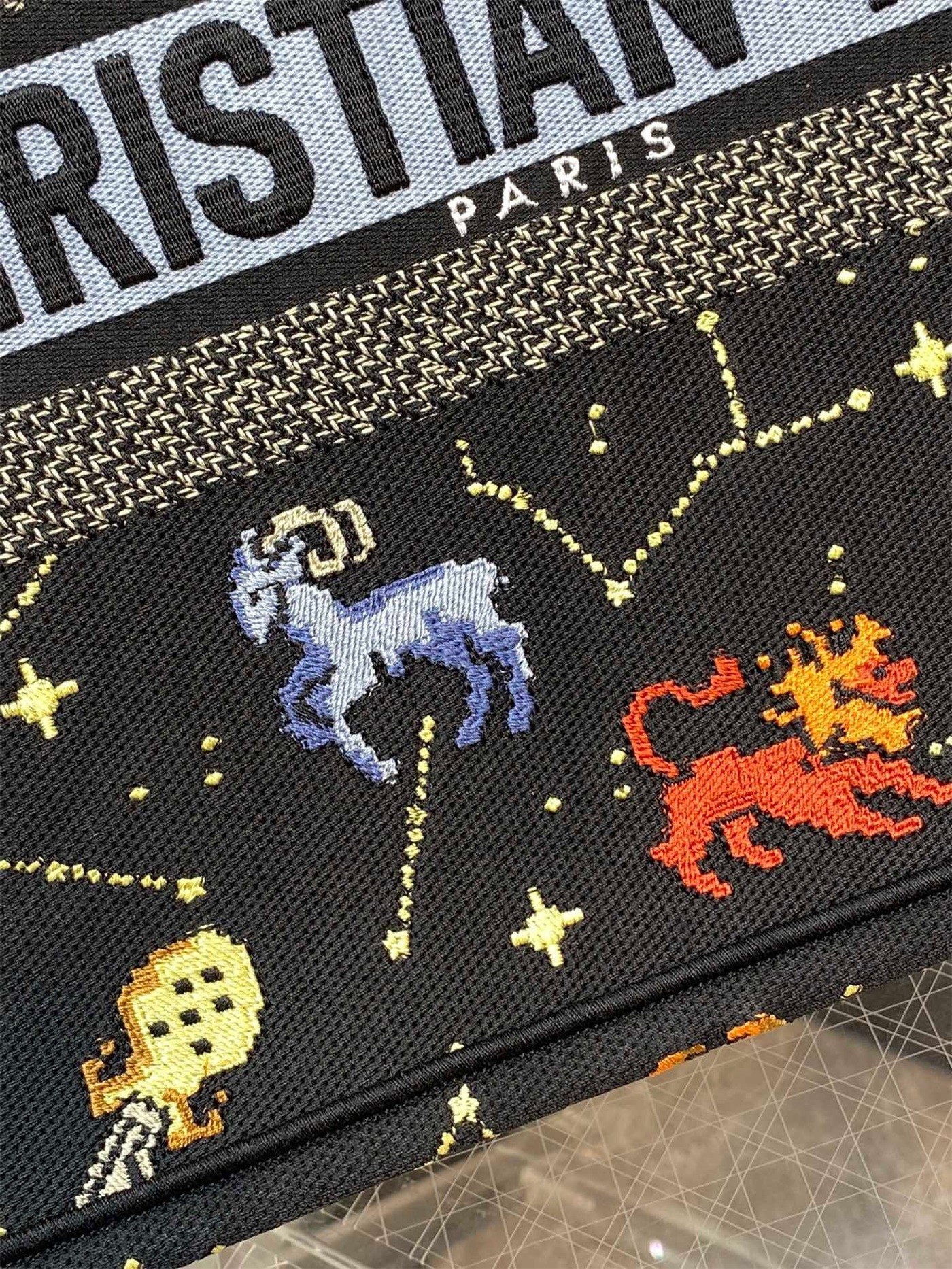 D*or medium book tote bag in black pixel zodiac embroidery