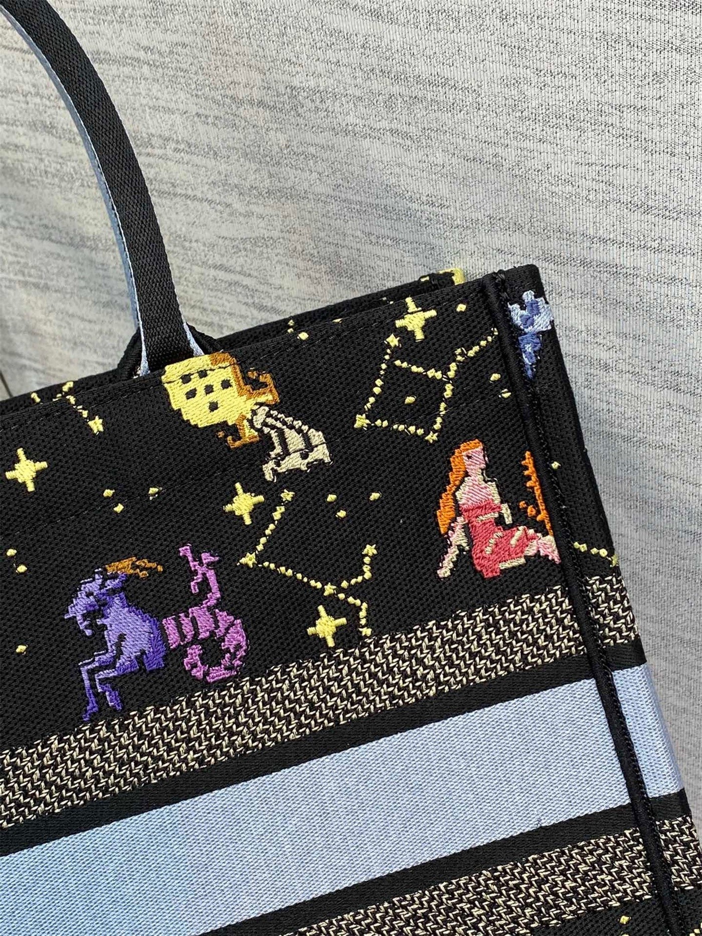 D*or medium book tote bag in black pixel zodiac embroidery