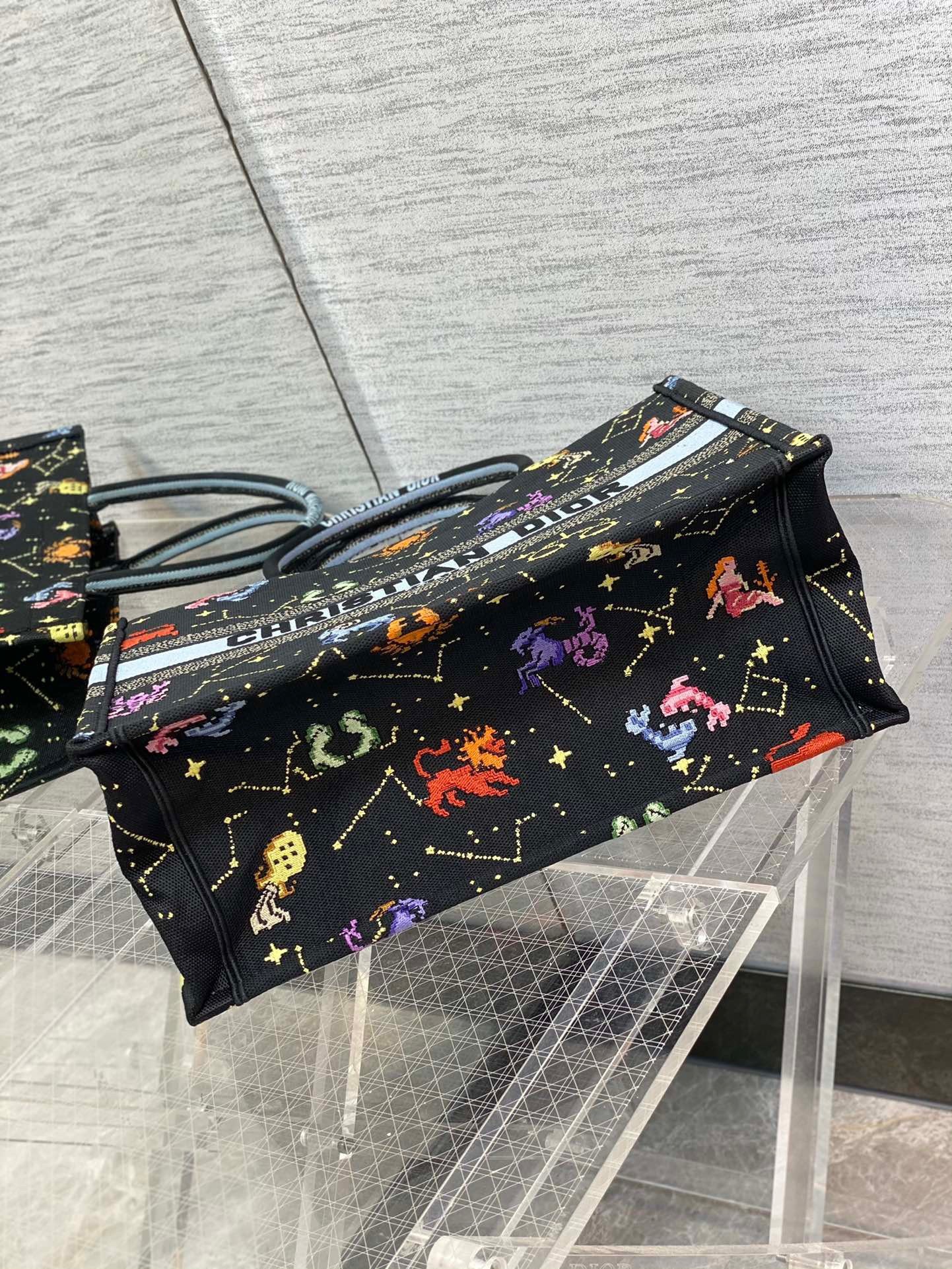 D*or medium book tote bag in black pixel zodiac embroidery