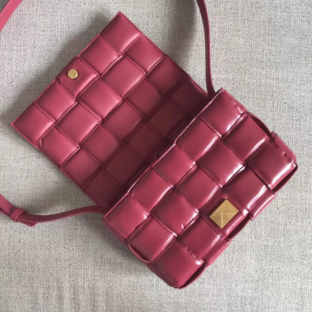 bo*te*ga Ve*ne*ta padded cassette bag in amaranto calfskin