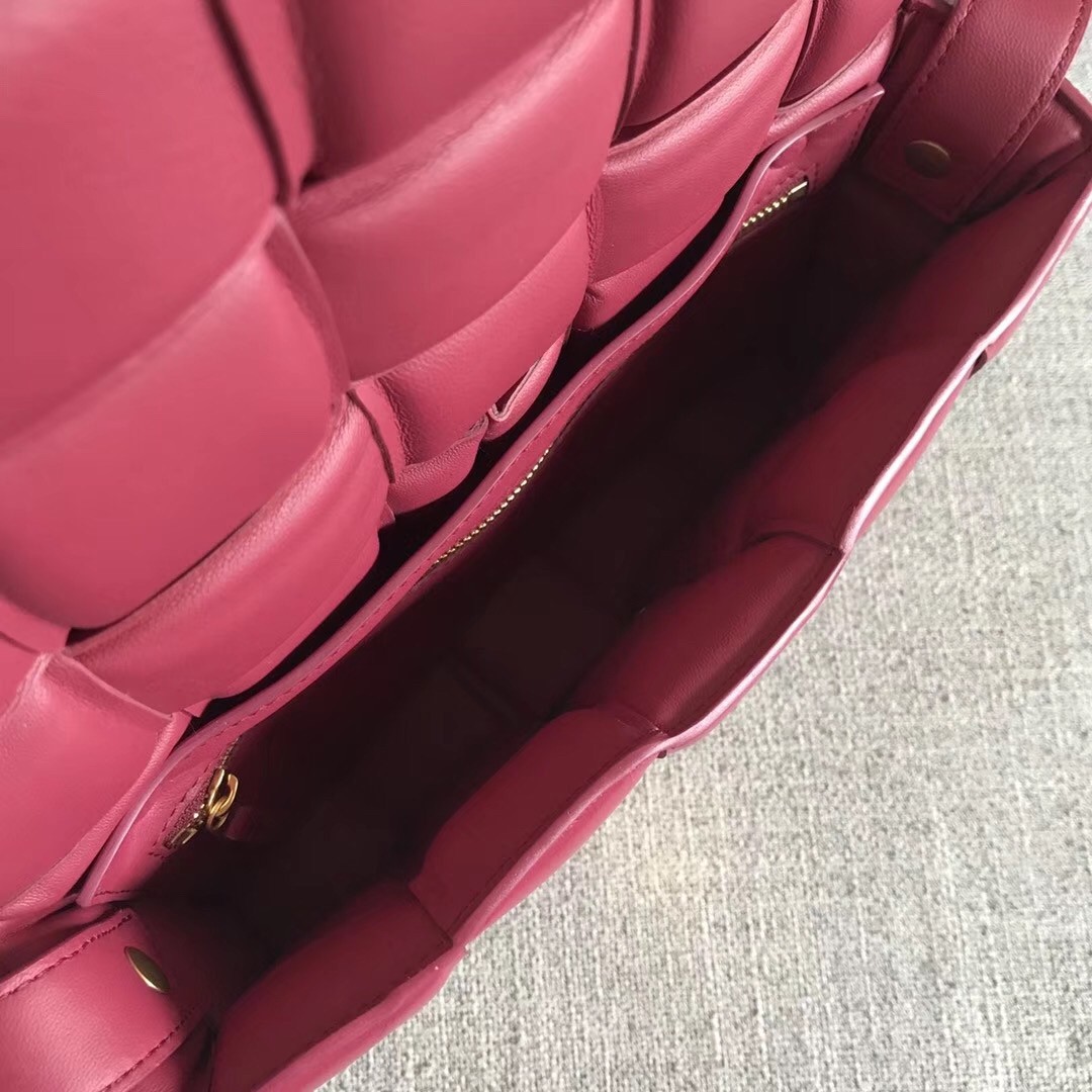 bo*te*ga Ve*ne*ta padded cassette bag in amaranto calfskin