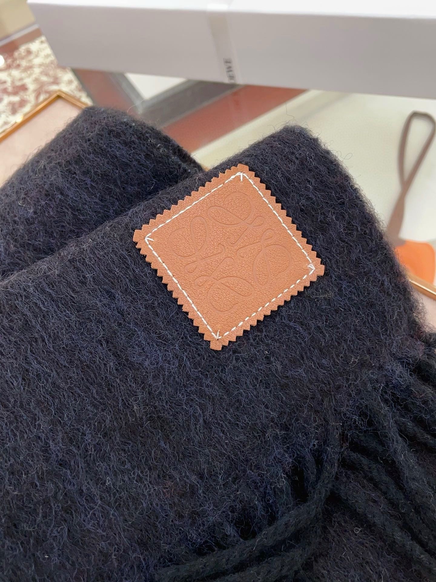 L0ew* scarf in black mohair and wool