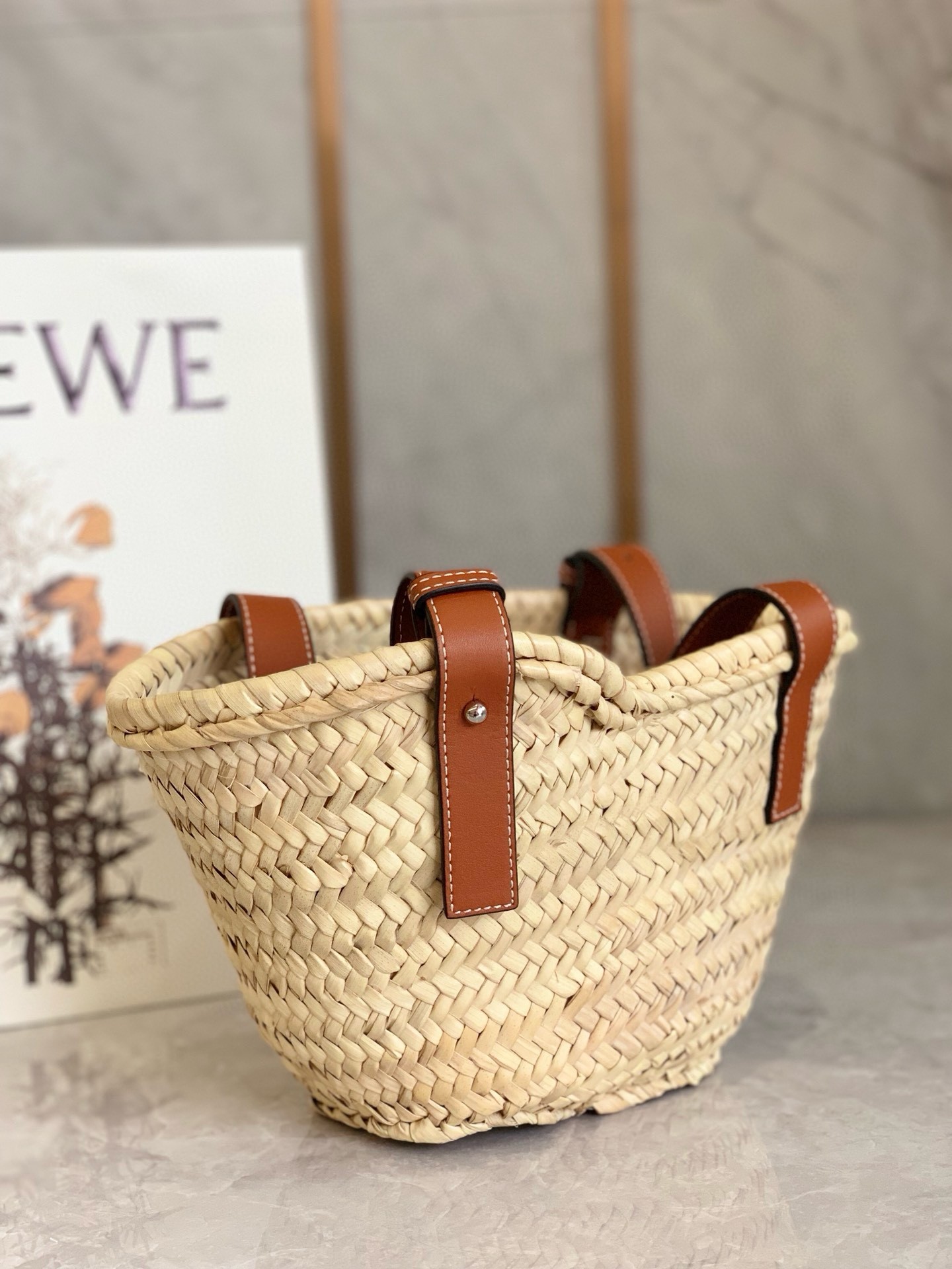 L0ew* small basket bag in raffia and brown calfskin