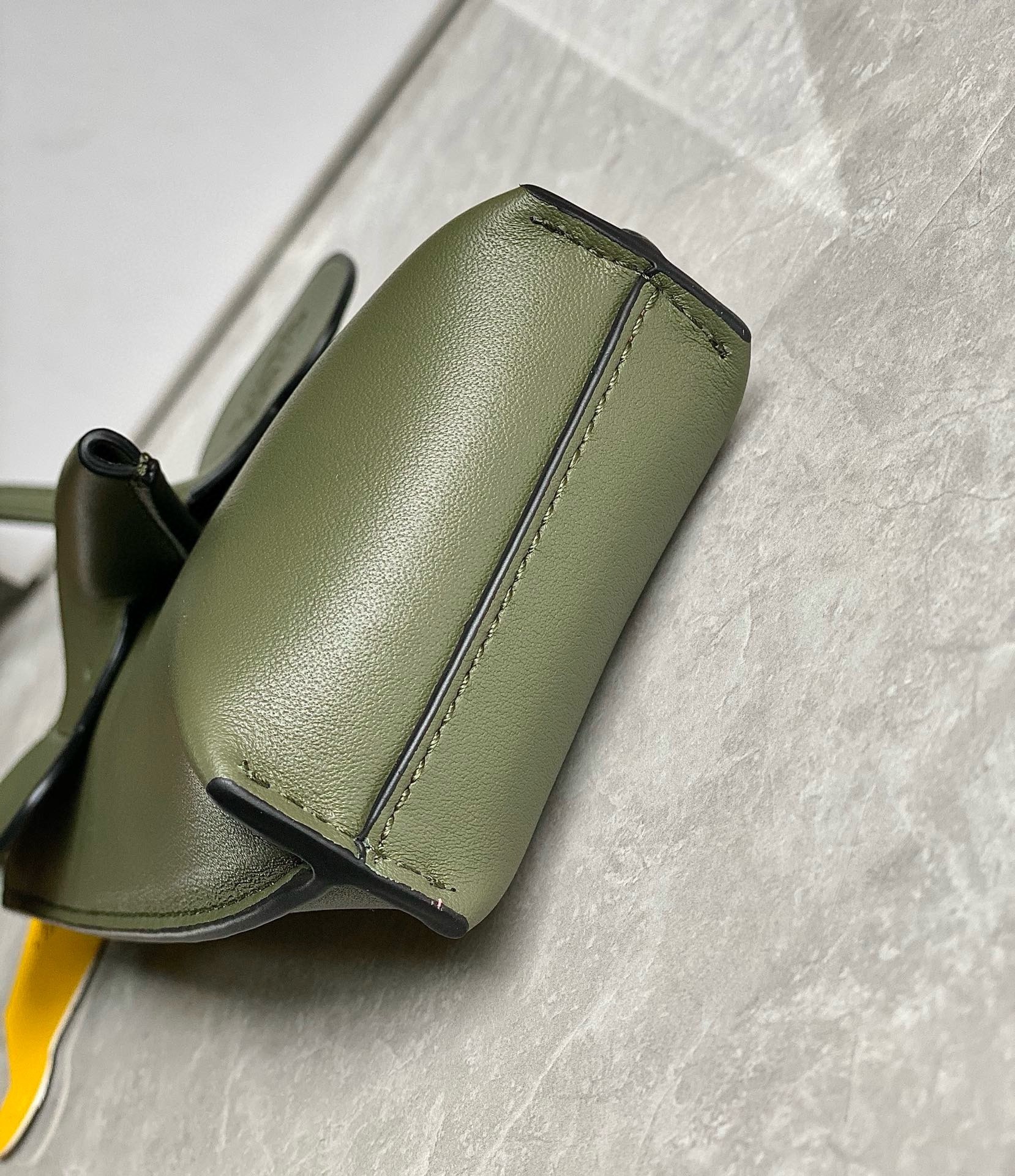 L0ew* elephant pocket in green calfskin
