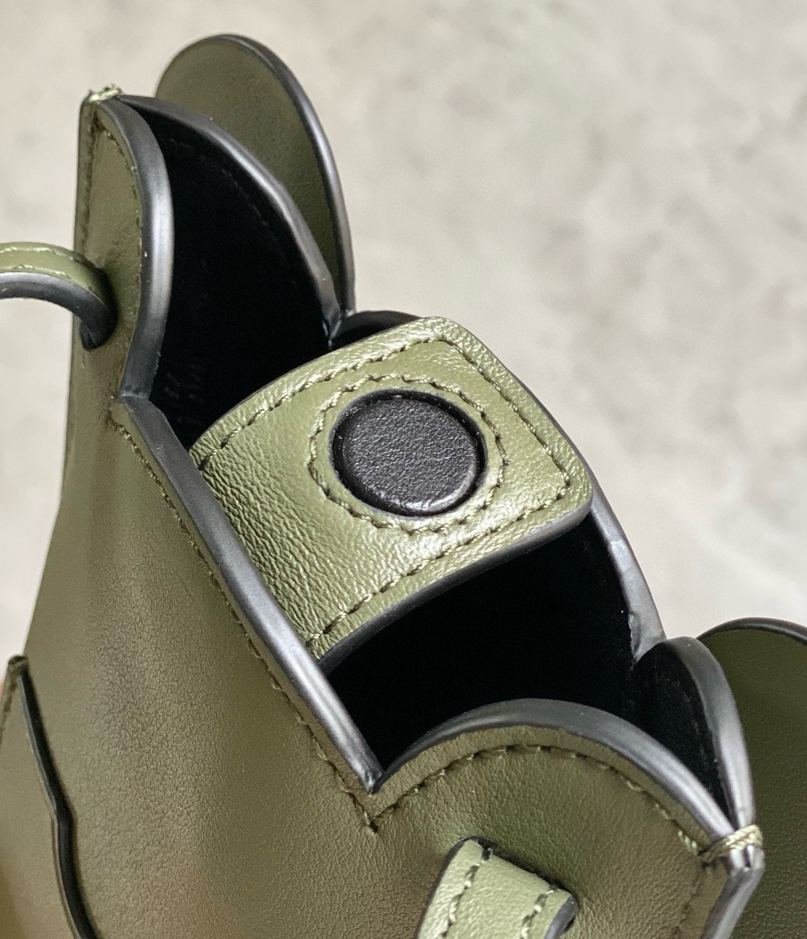 L0ew* elephant pocket in green calfskin