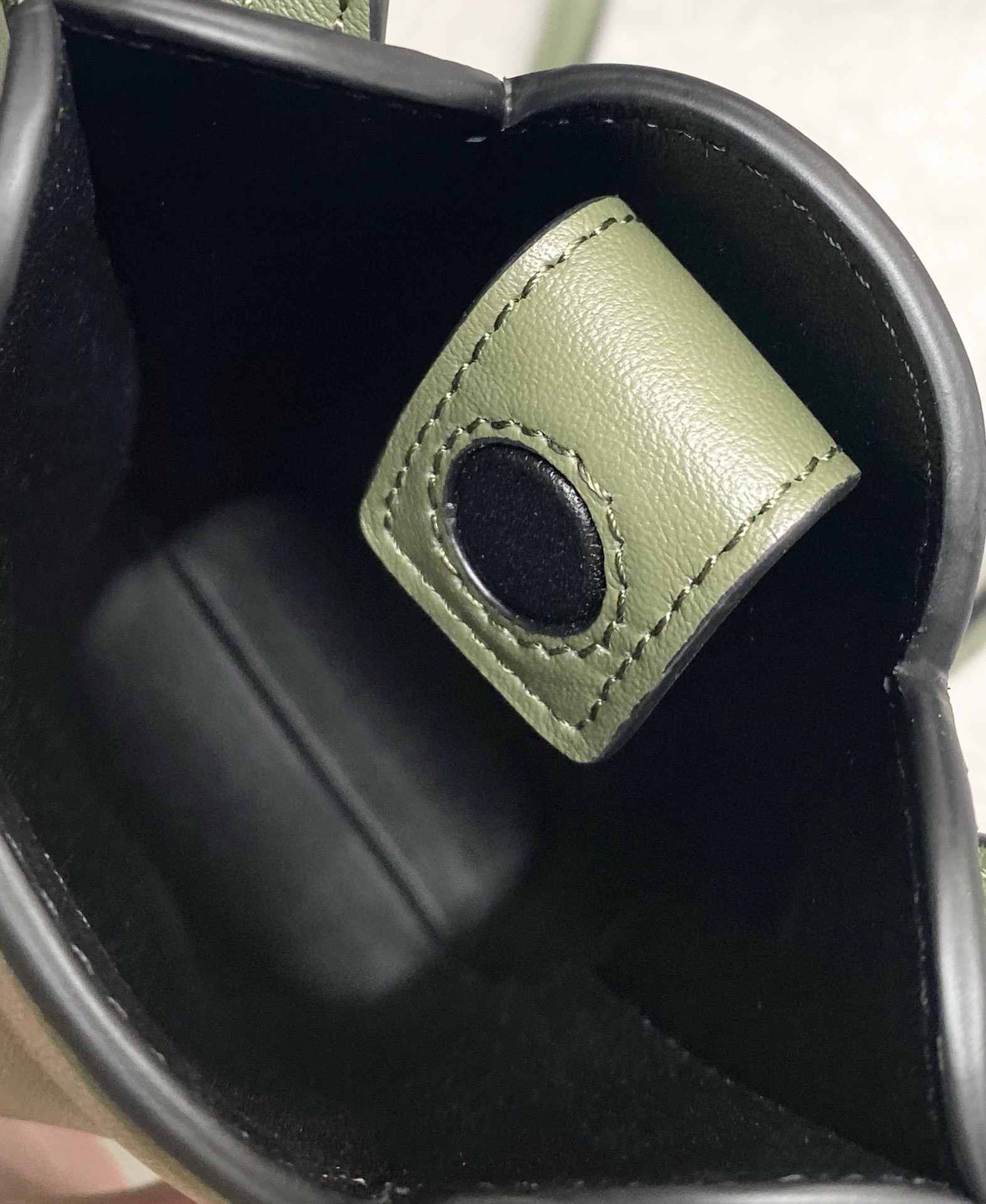 L0ew* elephant pocket in green calfskin