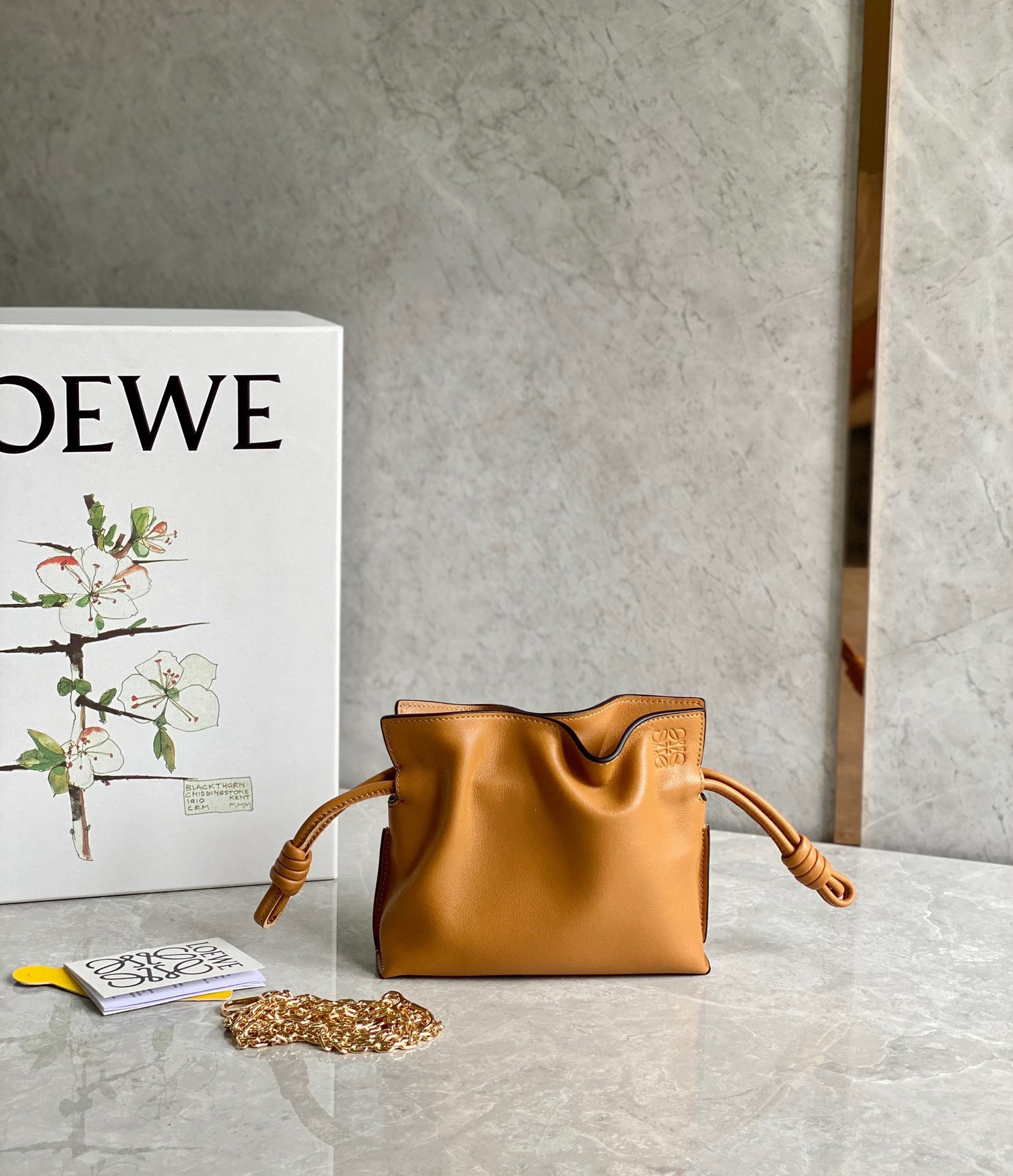 L0ew* flamenco nano clutch in brown nappa leather