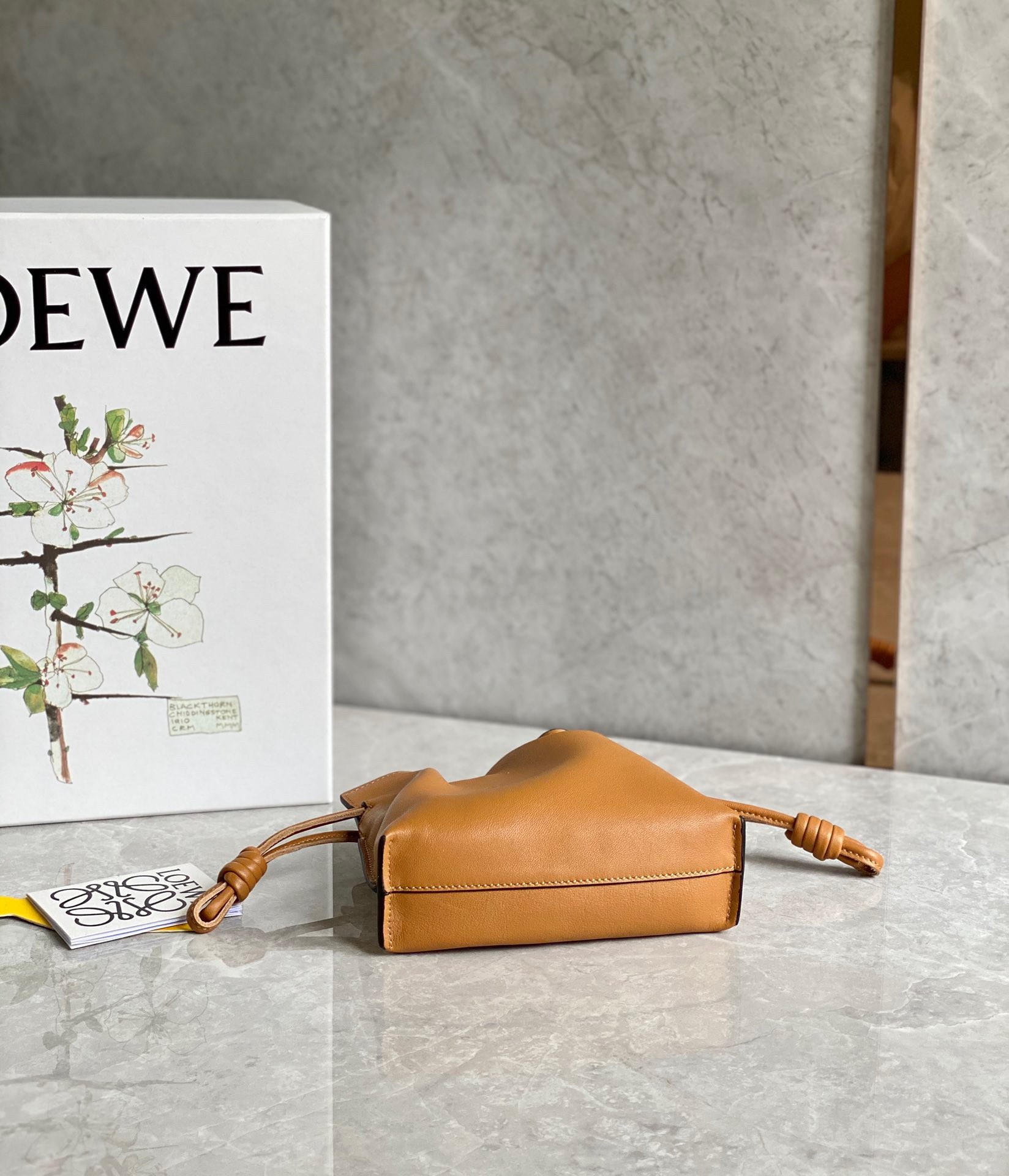 L0ew* flamenco nano clutch in brown nappa leather
