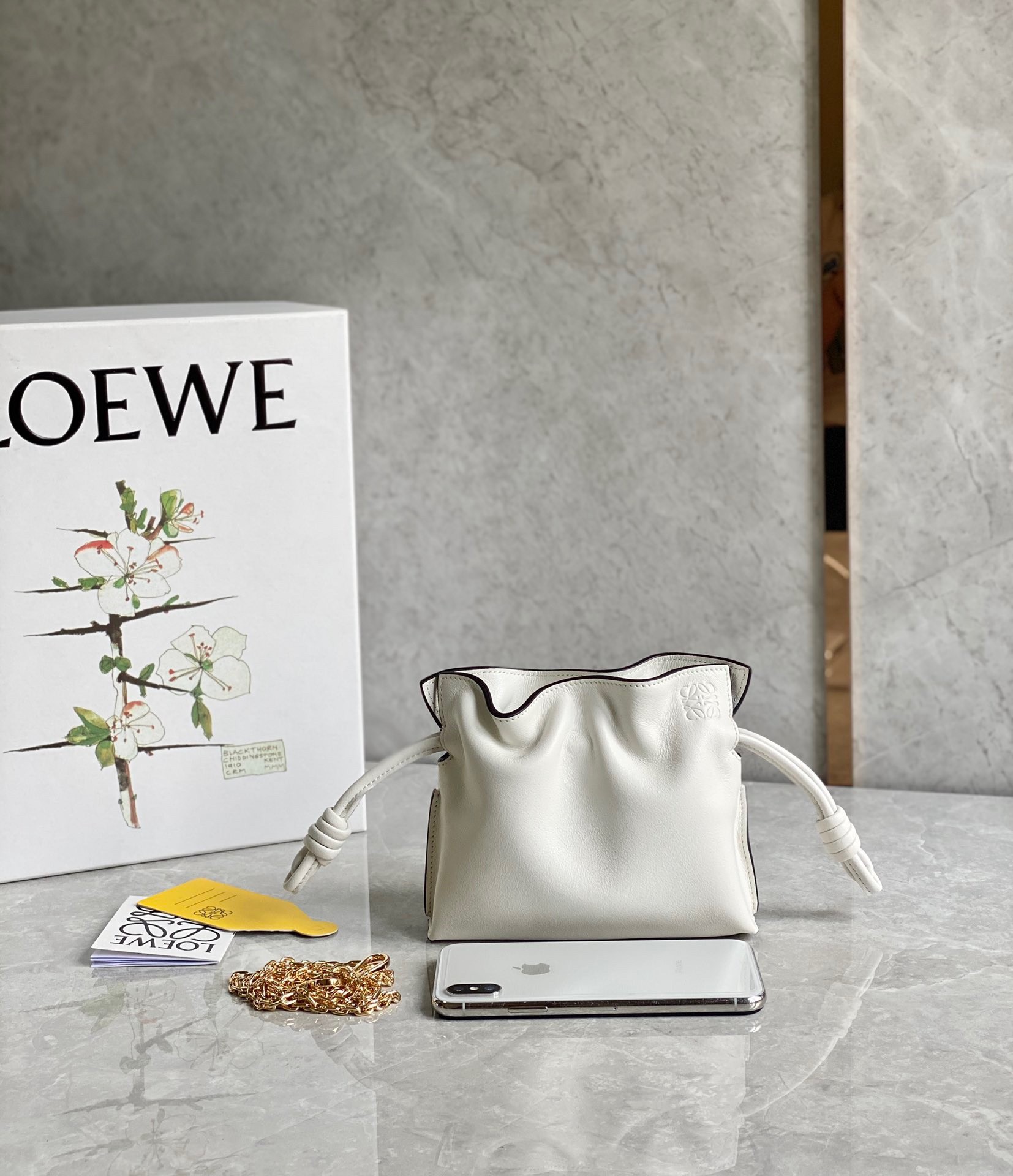 L0ew* flamenco nano clutch in white nappa leather
