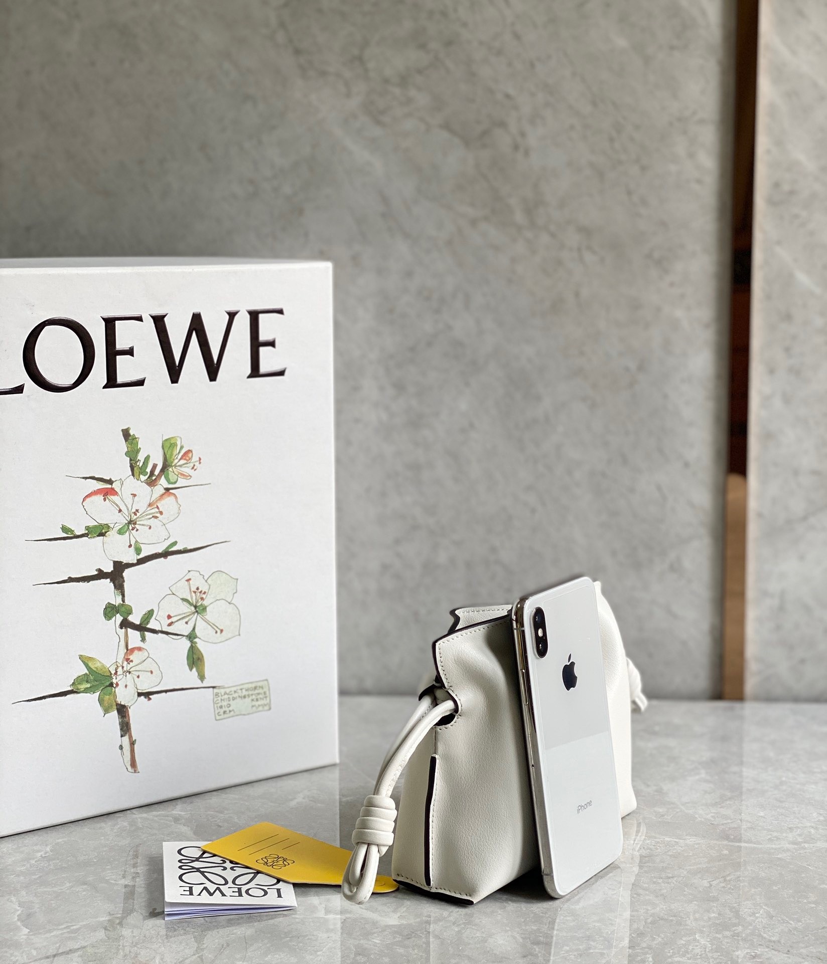 L0ew* flamenco nano clutch in white nappa leather