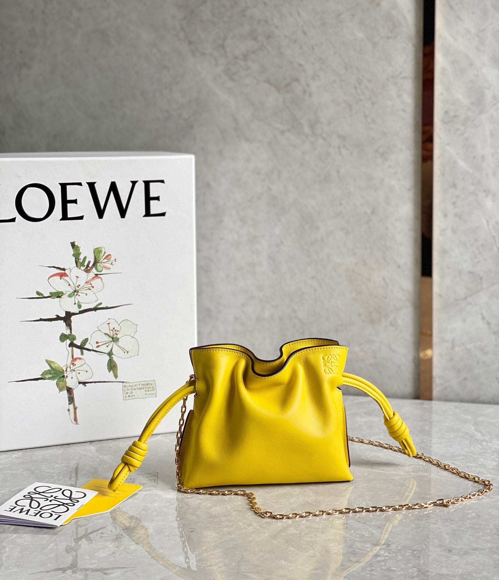 L0ew* flamenco nano clutch in yellow nappa leather
