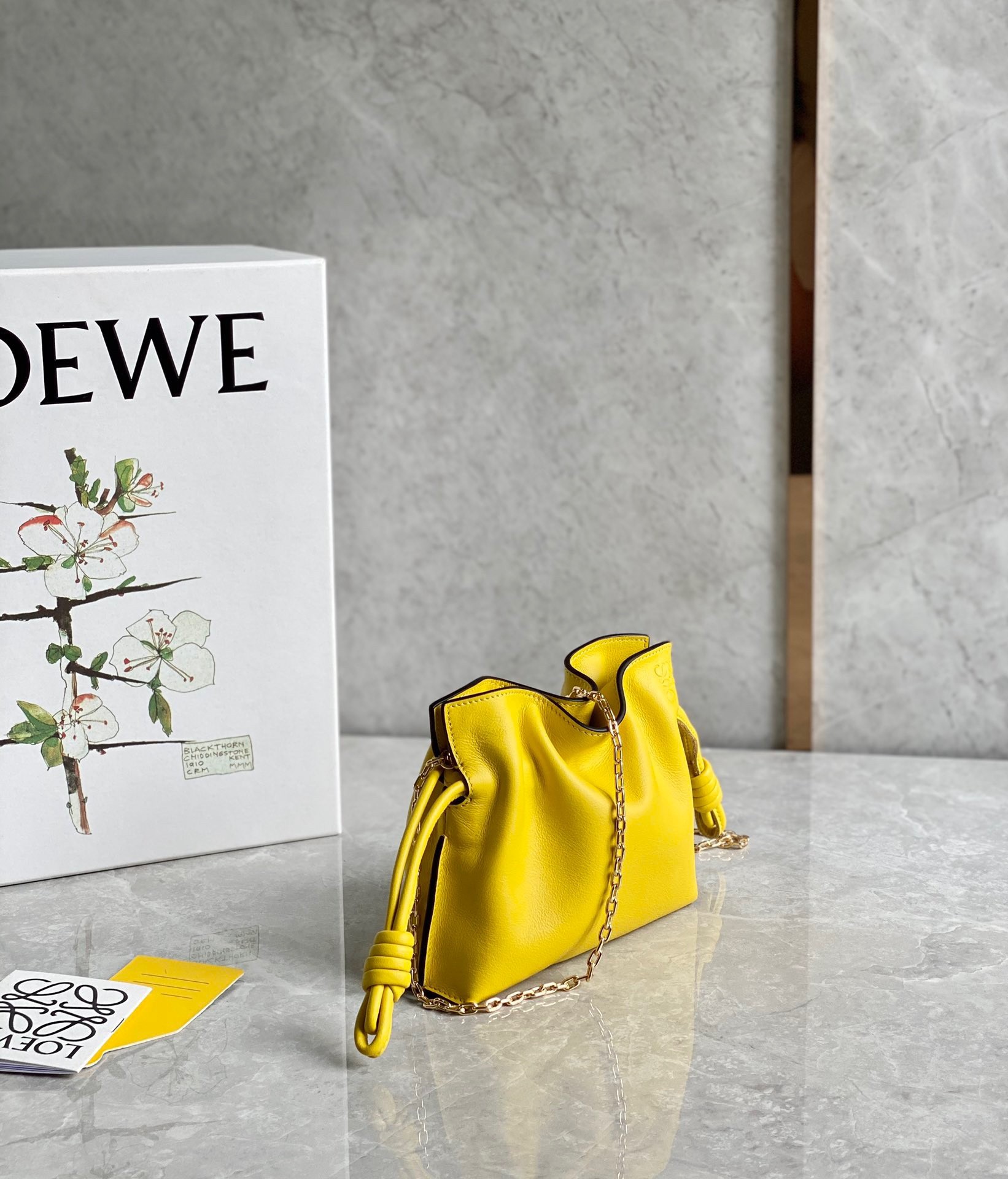 L0ew* flamenco nano clutch in yellow nappa leather