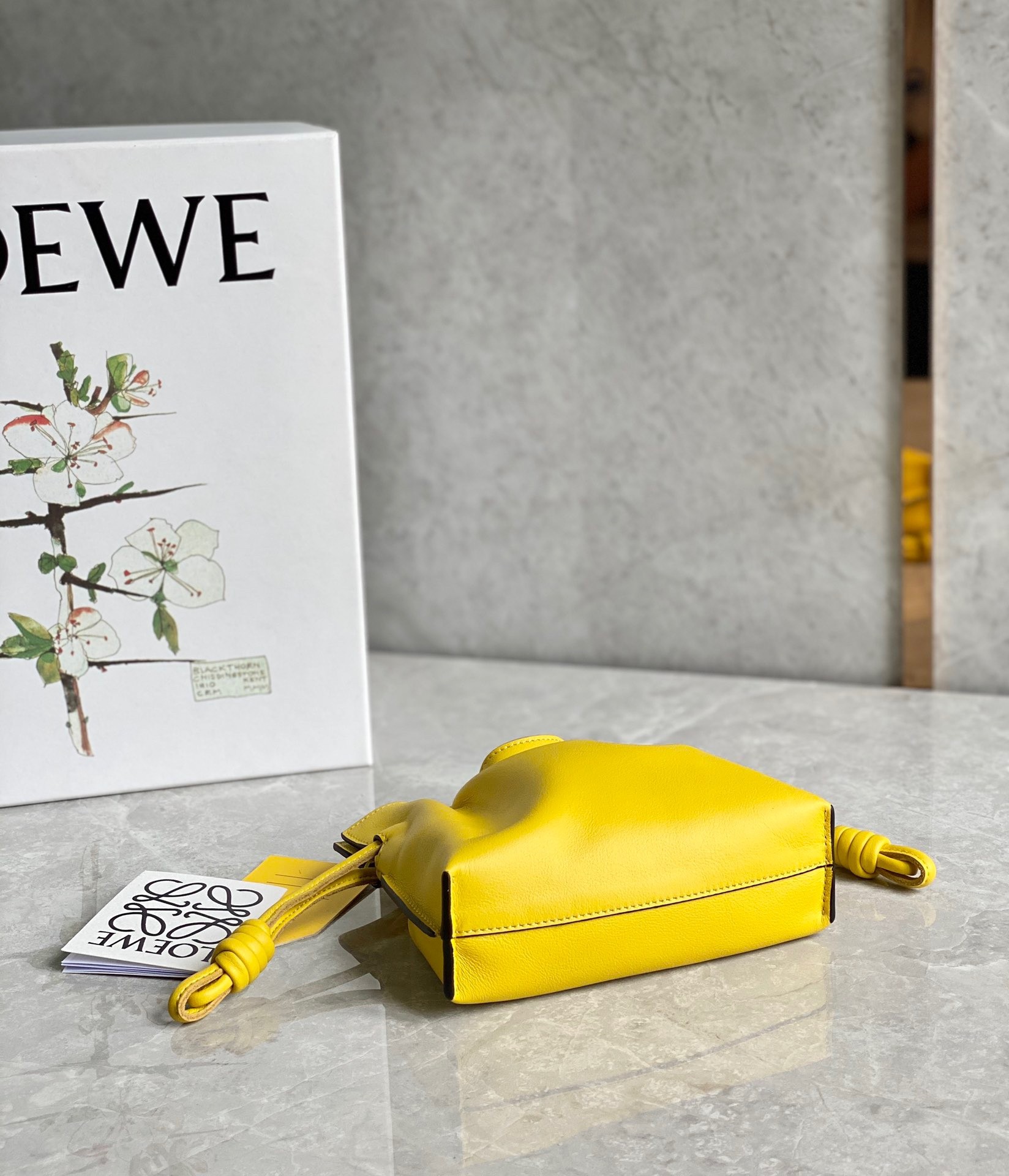 L0ew* flamenco nano clutch in yellow nappa leather